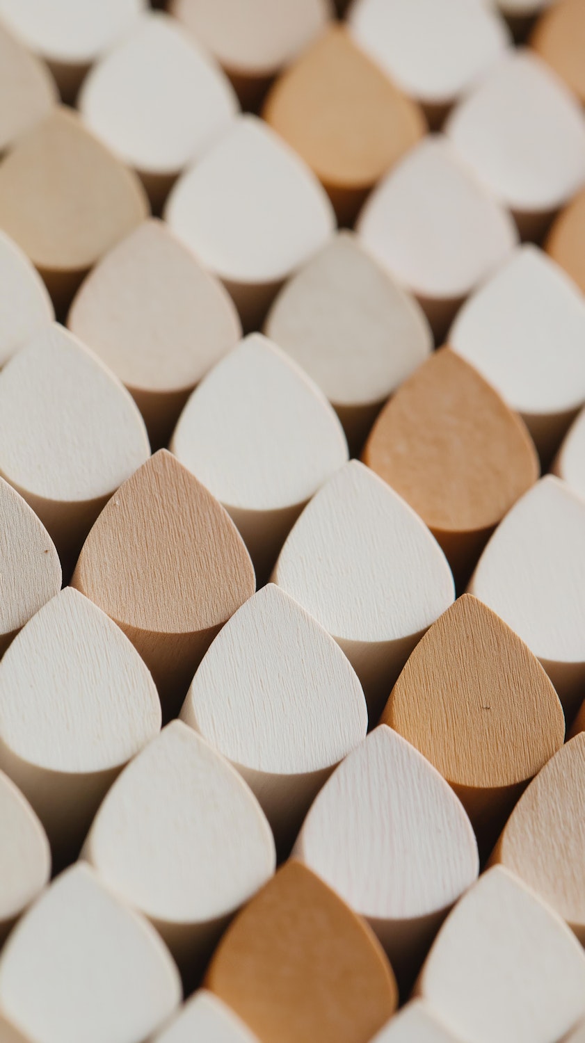 Close up of repeating wooden shapes forming a regular pattern
